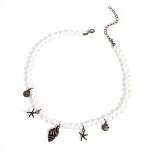 Elegant Pearl and brass Charm Necklace